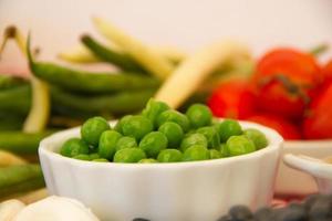 variety of kitchen ingredients with fresh and dried legumes photo