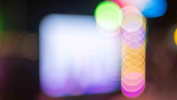 The whole bokeh image shows the yellow light in a flash. as wallpaper Focus on blurring the entire image to create bokeh of light photo