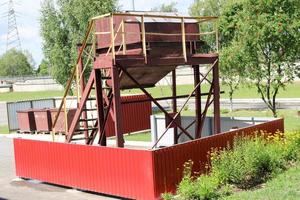 Large industrial brown waste collection bin, trash bins at an industrial plant photo