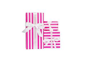 Set of Christmas or other holiday handmade present in pink paper with white ribbon. Isolated on white background, top view. thanksgiving Gift box concept photo