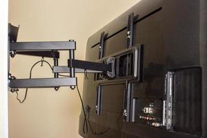 LCD display on the TV bracket. Swivel bracket for TV photo