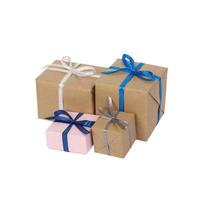 Christmas style rustic brown paper gift tied up with strings. Isolated white background. Stacking parcels box with kraft paper photo