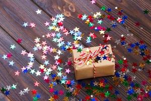 Christmas decoration with gift box for celebration with confetti Star best Christmas holidays background photo