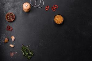 Ingredients for cooking at home  pepper, salt and rosemary photo