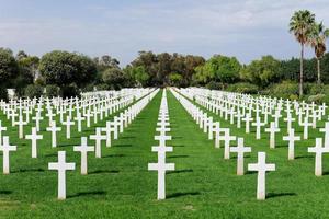 Carthage, Tunisia - October 10, 2022 North Africa American Cemetery, honoring the victims of World War 2. White tombstones and green maintained fields. Memorial and remembrance of fighters. photo