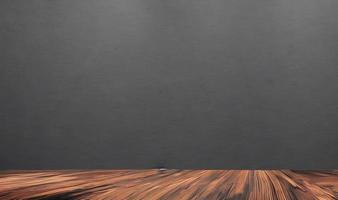 Empty wooden table in front of its background. photo