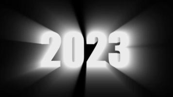 luz gráfica de computador abstrata de feliz ano novo 2023. animação de ilustração número cg luz brilhante sobre fundo preto video