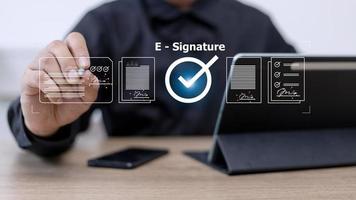 Online business contract Electronic signature, e-signing, digital document management, paperless office, signing business contract concept. photo