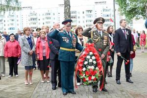 Men military and old man grandfather veteran of the Second World War in medals and decorations give honor show respect for the day of victory Moscow, Russia, 05.09.2018. photo