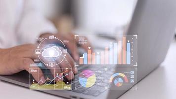 Analyst working with Business Analytics and Data Management System on computer, make a report with KPI and metrics connected to database. Corporate strategy for finance, operations, sales, marketing. photo
