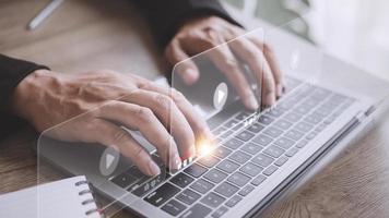 man using mouse and keyboard for streaming online, watching video on internet, live concert, show or tutorial photo