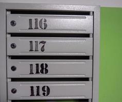 Mailboxes in the hallway. Apartment numbers photo