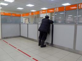 The man at the checkout. Service in a booth at the reception of officials. Appointment with a specialist. P photo