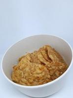This is a close up photo of tempe chips in a small bowl.