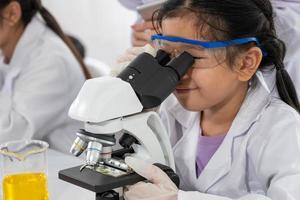 Portrait of Young Aisan Girl Learning Science in Laboratory photo