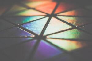 Holographic triangular background filtered photo