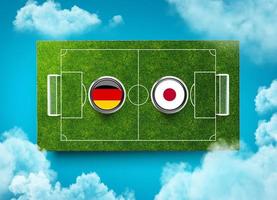banderas de alemania vs japón con escudo en el estadio de fútbol ilustración 3d foto