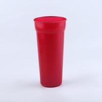 red plastic cup isolated on a white background photo