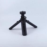 mini mobile tripod isolated on a white background photo