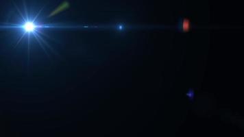 Lens flare, Optical lens flare effect, overlay light effect, Glowing Light on black.4K video