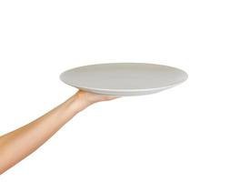 white kitchen plate on hand on white background. perspective view, isolated on white background photo