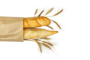 mini baguettes in pacage with wheat on white background photo