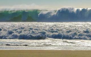 Extremely huge big surfer waves at beach Puerto Escondido Mexico. photo