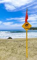 Red flag swimming prohibited high waves in Puerto Escondido Mexico. photo