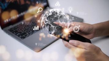 People use mobile smartphones. Business global internet connection application technology and digital marketing, Financial and banking, Digital link tech, big data. photo