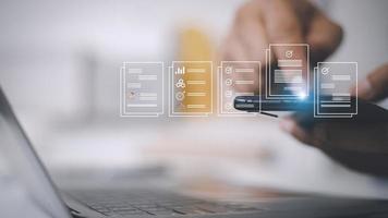 electronics document icons, E-document management, online documentation database, paperless office concept photo