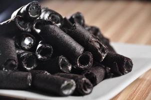 Vanilla wafer sticks on a plate photo