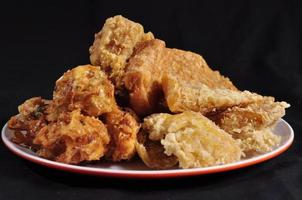 various fried foods, made from tempeh, tofu, bakwan, banana and sweet potato photo