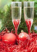 Two glasses with red Xmas decorations and tree 6 photo