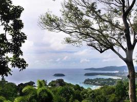 High angle view of famous Viewpoint, a tourist unseen Thailand of Phuket island. Overlooking bays, green forests, seas, mountains. Wallpaper photo