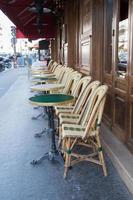 Empty cafe terrace in Paris. Chairs in a row photo