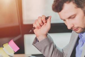 Business Thinking, Businessman Decision, Hand Holding Pen photo