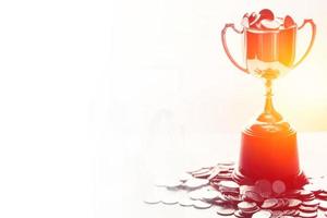 Winner cup with coin money award white space for text photo