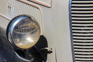 Old Glass Headlight Off Antique Car photo