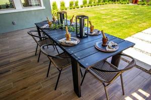 Rear Patio Wooden Table With Chairs photo