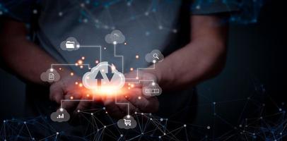Cloud storage, Digital service data connection application network, transfers data to a server, hosting service. Web-based cloud concept. Business hands holding virtual Clouds services. photo