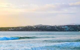 Extremely huge big surfer waves at beach Puerto Escondido Mexico. photo