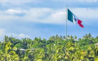 Mexican green white red flag in Zicatela Puerto Escondido Mexico. photo