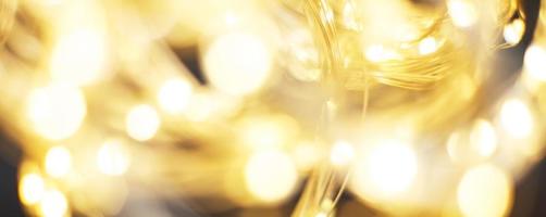 hermoso fondo de oro brillante de navidad. brillo festivo bokeh borroso foto