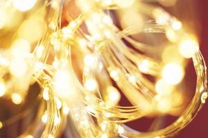 christmas beautifull shiny gold and red background. sparkle festive blurred bokeh photo