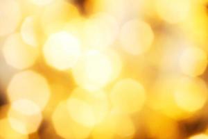 hermoso fondo de oro brillante de navidad. brillo festivo bokeh borroso foto