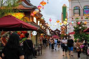 Tangerang, West Java, Indonesia, 2022 - Visitors hanging out at the PIK Chinatown Pantjoran Area. photo