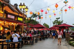 Tangerang, West Java, Indonesia, 2022 - Visitors hanging out at the PIK Chinatown Pantjoran Area. photo