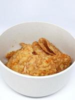 This is a close up photo of tempe chips in a small bowl.
