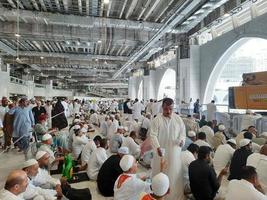 Mecca, Saudi Arabia, Nov 2022 - Pilgrims from around the world wait for Friday prayers on the first floor of Masjid al-Haram in Makkah, Saudi Arabia. photo