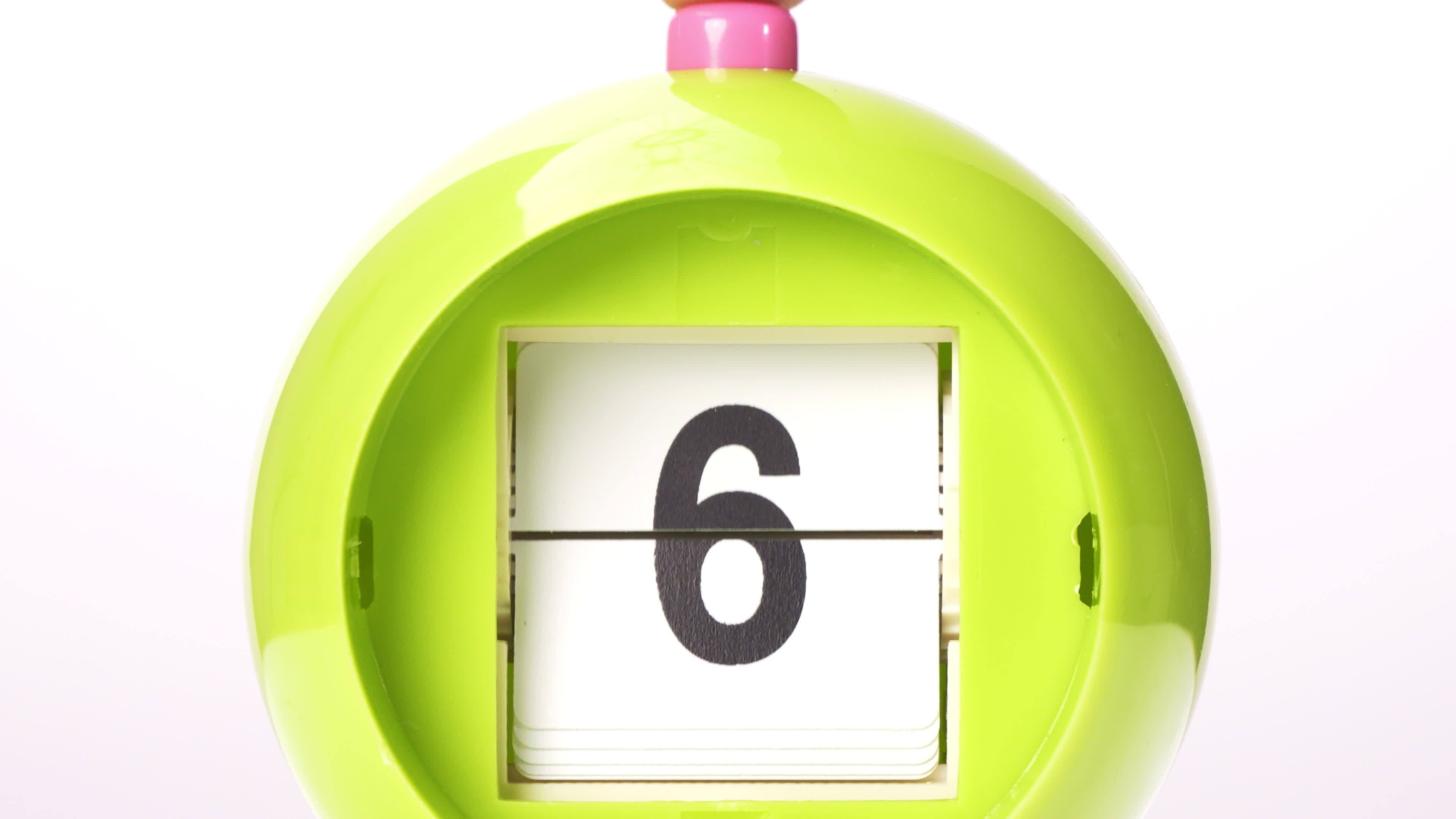 Close-up of a clock ticking countdown on a white background. 14289655 